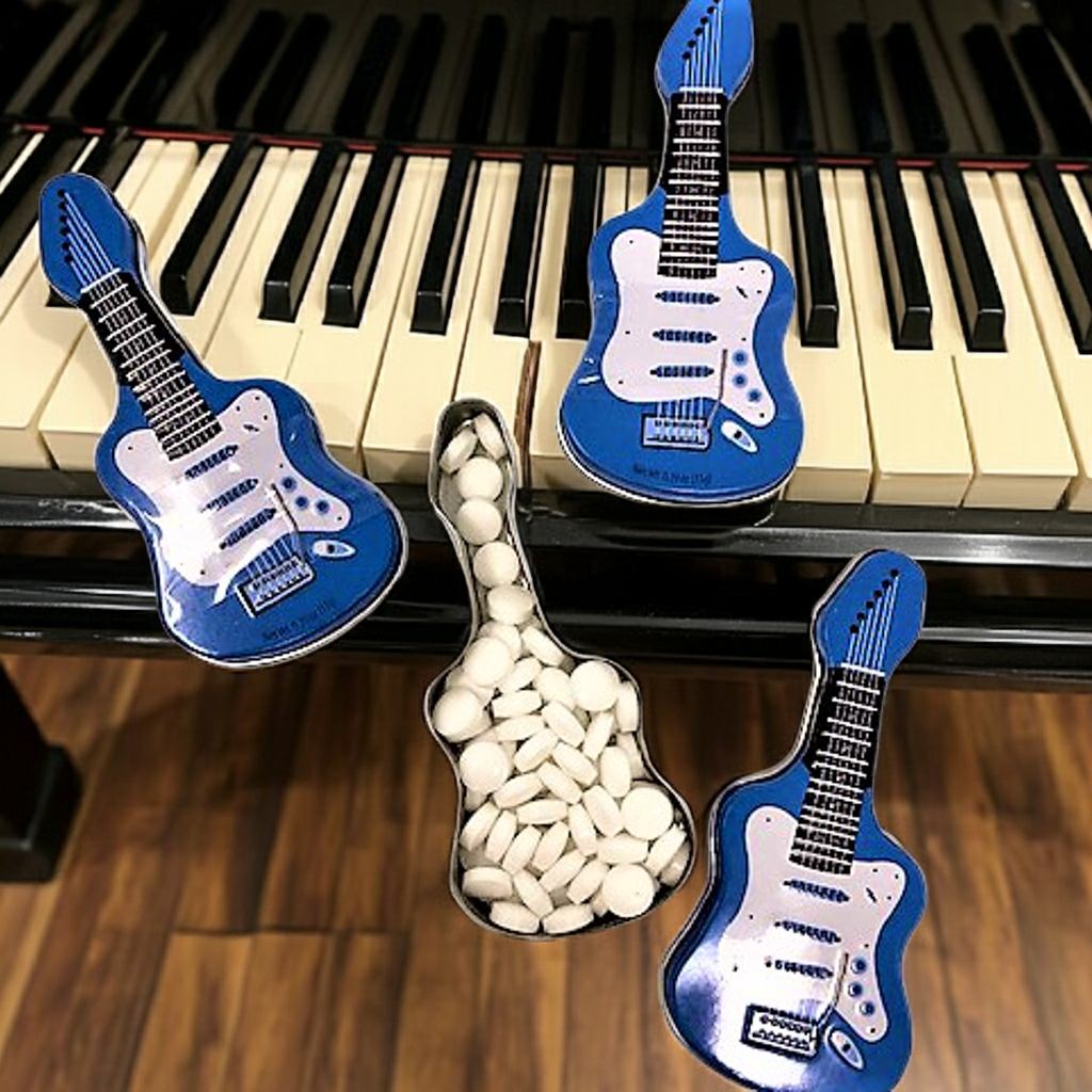 Breath mint in an electric guitar tin